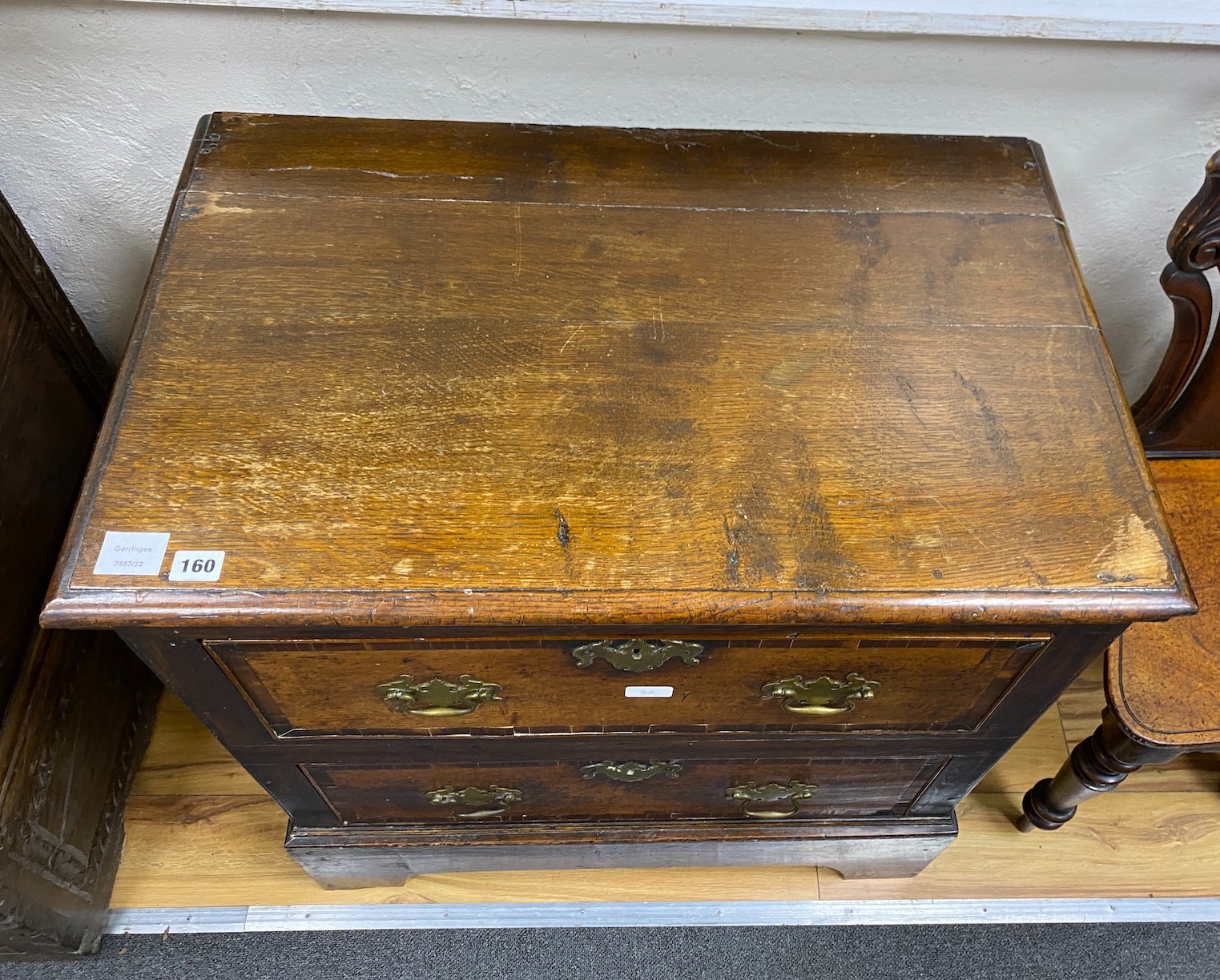 A late 18th century oak and mahogany banded chest of two drawers, width 76cm, depth 49cm, height 75cm